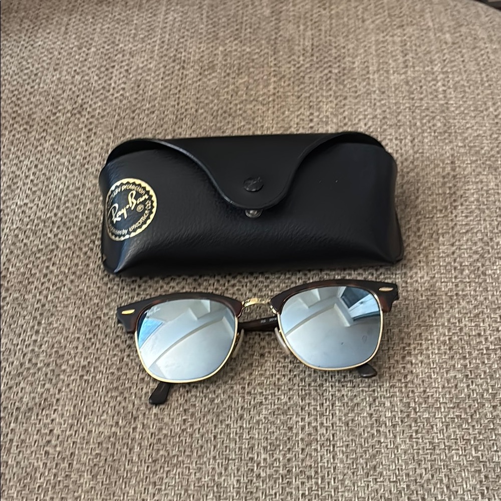 Ray-Ban Clubmaster Sunglasses with Black and Gold Accents